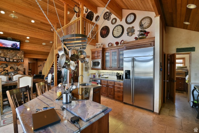 3090 N Rocky Rd E, Kamas, UT 84036 - kitchen with high vaulted ceiling, wood ceiling, built in appliances, and recessed lighting