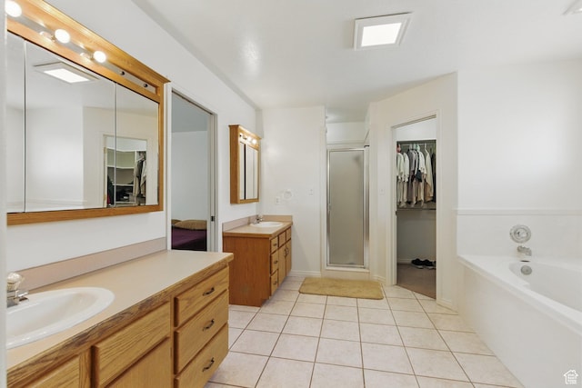 150 S Haulage Rd, Eureka, UT 84628 - bathroom with a stall shower, tile patterned flooring, a sink, and two vanities