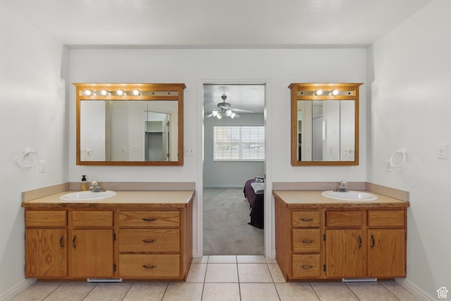 150 S Haulage Rd, Eureka, UT 84628 - ensuite bathroom featuring two vanities, ensuite bath, and a sink