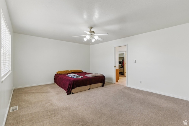150 S Haulage Rd, Eureka, UT 84628 - bedroom featuring visible vents, light carpet, and multiple windows