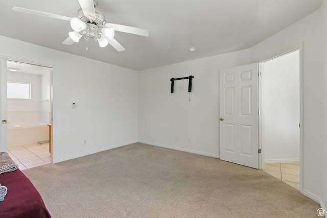 150 S Haulage Rd, Eureka, UT 84628 - interior space with tile patterned floors, carpet, ceiling fan, and baseboards