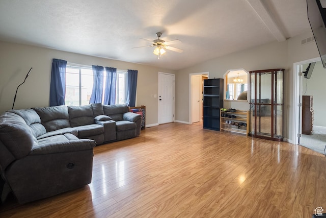 303 W 2000 S, Vernal, UT 84078 - living area featuring baseboards, wood finished floors, ceiling fan, and vaulted ceiling