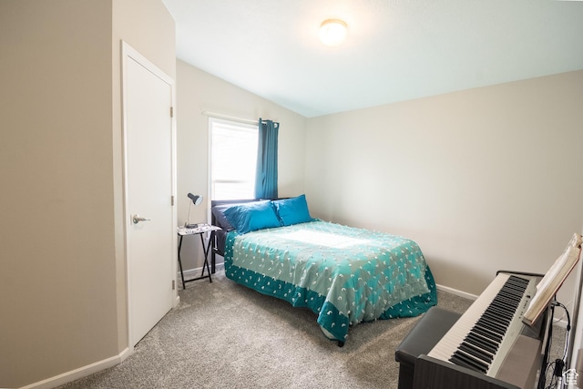 303 W 2000 S, Vernal, UT 84078 - bedroom with baseboards, carpet, and vaulted ceiling