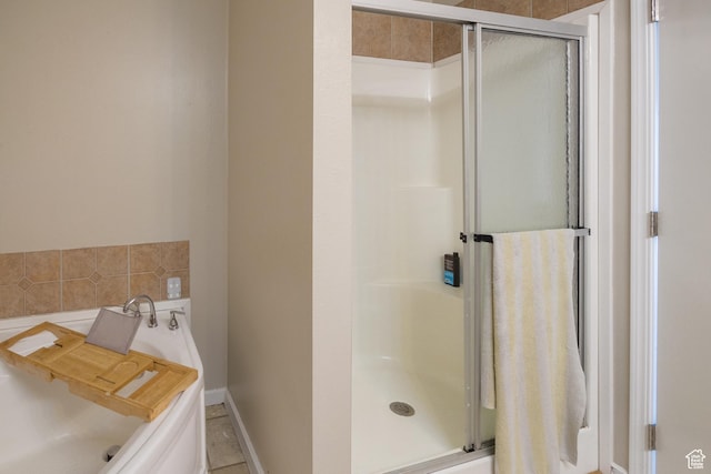 303 W 2000 S, Vernal, UT 84078 - bathroom with baseboards, a stall shower, and a garden tub