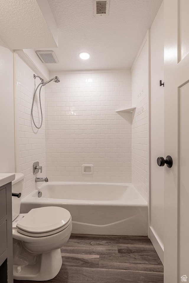 326 E 200 S, Logan, UT 84321 - full bathroom with visible vents, wood finished floors, toilet, and vanity