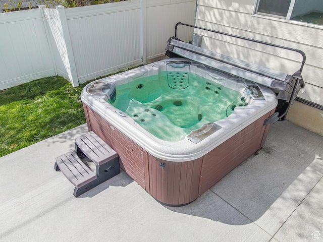 326 E 200 S, Logan, UT 84321 - details with fence and a hot tub