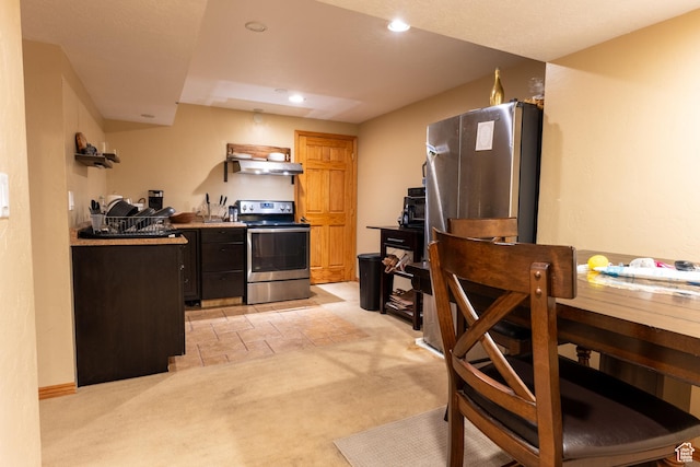 2548 E Cobblestone Way, Sandy, UT 84093 - kitchen featuring stainless steel appliances, light colored carpet, recessed lighting, and extractor fan