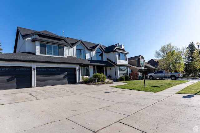 2548 E Cobblestone Way, Sandy, UT 84093 - view of property featuring a front yard, concrete driveway, a garage, a residential view, and a chimney