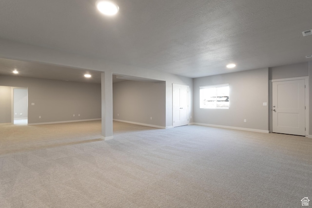 2552 W 2950 N Unit 119, Farr West, UT 84404 - basement featuring recessed lighting, visible vents, baseboards, and light carpet