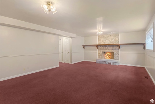 3131 E Alta Hills Dr S, Cottonwood Heights, UT 84093 - unfurnished living room featuring visible vents, a fireplace, baseboards, an inviting chandelier, and carpet flooring