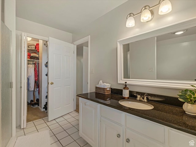 3131 E Alta Hills Dr S, Cottonwood Heights, UT 84093 - bathroom featuring vanity, tile patterned floors, and a spacious closet