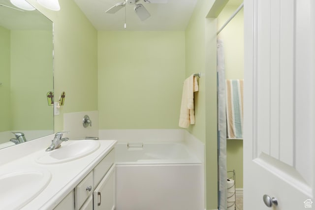 7170 S 420 E, Midvale, UT 84047 - full bathroom featuring ceiling fan, double vanity, a bath, and a sink