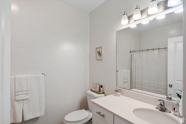 463 W 60 S Unit M204, Providence, UT 84332 - full bath with toilet, vanity, and a shower with shower curtain