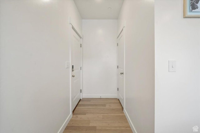 463 W 60 S Unit M204, Providence, UT 84332 - hall with baseboards and light wood finished floors