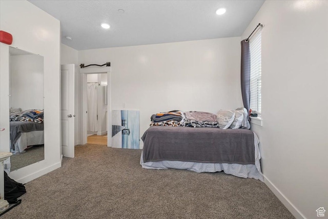 463 W 60 S Unit M204, Providence, UT 84332 - carpeted bedroom featuring baseboards and recessed lighting