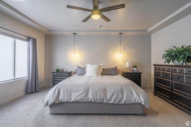 658 N Sage Crest Dr, Washington, UT 84780 - bedroom with a textured ceiling, visible vents, carpet floors, and baseboards