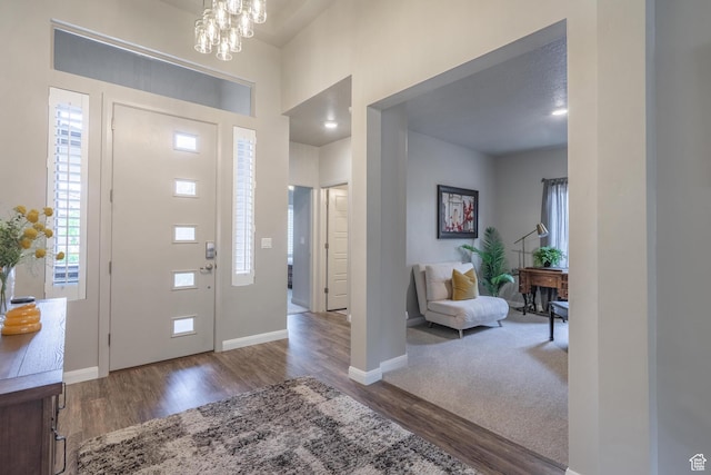 658 N Sage Crest Dr, Washington, UT 84780 - entryway featuring an inviting chandelier, wood finished floors, and baseboards