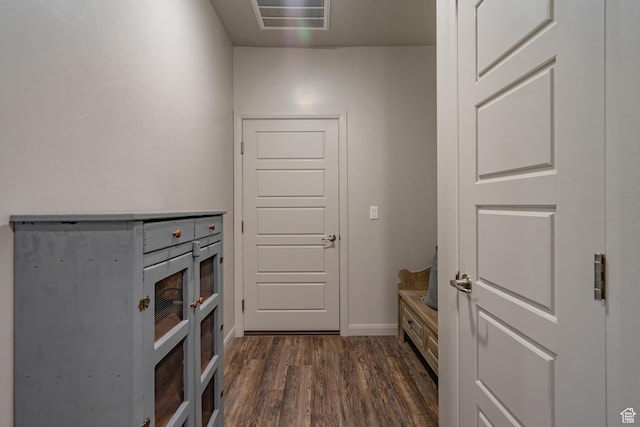 658 N Sage Crest Dr, Washington, UT 84780 - corridor with baseboards, visible vents, and dark wood-style flooring