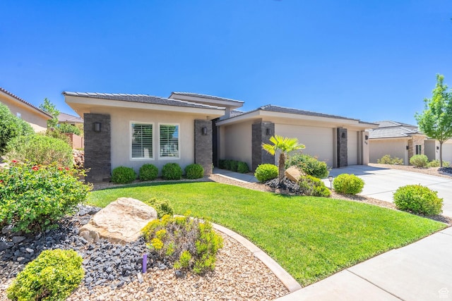 658 N Sage Crest Dr, Washington, UT 84780 - prairie-style home with driveway, stone siding, an attached garage, stucco siding, and a front lawn