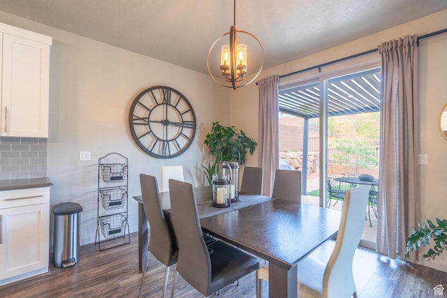 658 N Sage Crest Dr, Washington, UT 84780 - dining room featuring dark wood-style floors and a notable chandelier