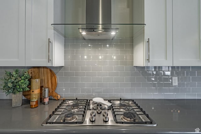 658 N Sage Crest Dr, Washington, UT 84780 - kitchen featuring stainless steel gas stovetop, white cabinets, ventilation hood, and backsplash