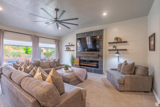 658 N Sage Crest Dr, Washington, UT 84780 - carpeted living area with recessed lighting, a tiled fireplace, ceiling fan, visible vents, and baseboards