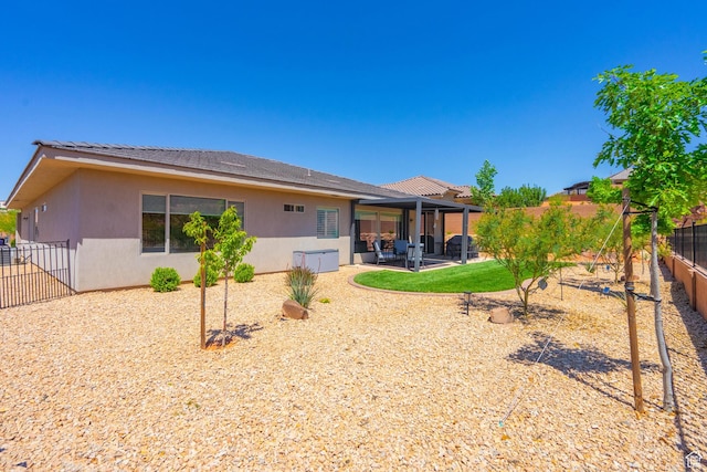 658 N Sage Crest Dr, Washington, UT 84780 - back of house with a patio, stucco siding, and a fenced backyard