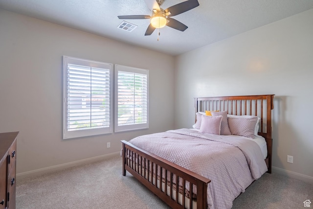 658 N Sage Crest Dr, Washington, UT 84780 - carpeted bedroom featuring a ceiling fan, visible vents, and baseboards