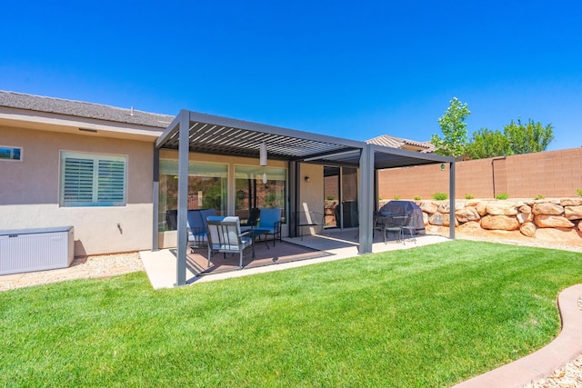 658 N Sage Crest Dr, Washington, UT 84780 - back of house with fence, a yard, a patio area, and stucco siding