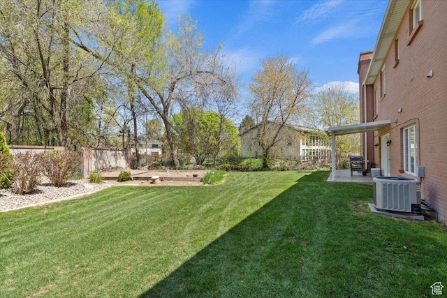 4972 S Boabab Crk, Holladay, UT 84117 - view of yard featuring fence, central AC unit, a garden, and a patio
