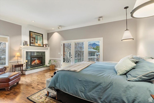 4972 S Boabab Crk, Holladay, UT 84117 - bedroom featuring wood finished floors, crown molding, and access to outside
