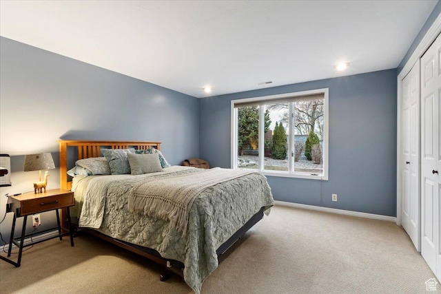 4972 S Boabab Crk, Holladay, UT 84117 - bedroom featuring a closet, carpet flooring, visible vents, and baseboards