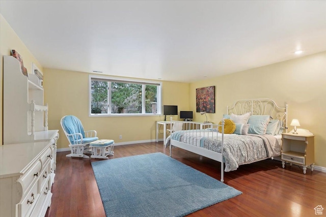 4972 S Boabab Crk, Holladay, UT 84117 - bedroom featuring baseboards and dark wood-type flooring