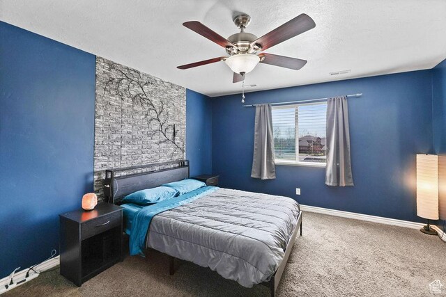 1410 S 4100 W, Syracuse, UT 84075 - bedroom with a textured ceiling, visible vents, baseboards, carpet, and a ceiling fan