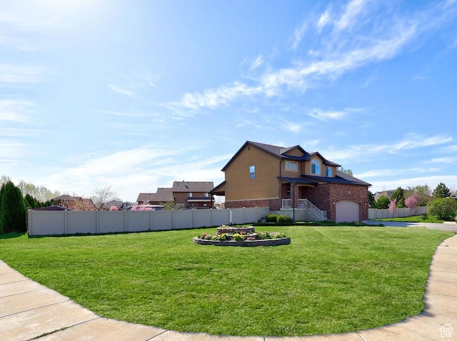 1410 S 4100 W, Syracuse, UT 84075 - exterior space featuring stucco siding, a yard, brick siding, fence, and an attached garage