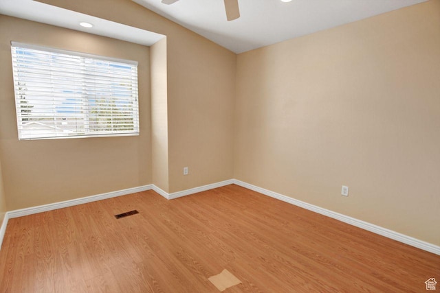 6497 W King Valley Rd, West Valley City, UT 84128 - spare room with a ceiling fan, visible vents, light wood-style flooring, and baseboards