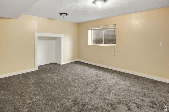 6497 W King Valley Rd, West Valley City, UT 84128 - empty room with a textured ceiling, carpet, and baseboards