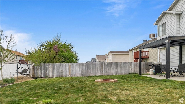 4799 S 3950 W, Roy, UT 84067 - view of yard with an outdoor fire pit, a fenced backyard, central AC unit, and a patio area