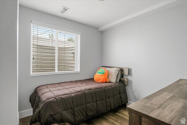 4799 S 3950 W, Roy, UT 84067 - bedroom featuring visible vents, wood finished floors, and baseboards