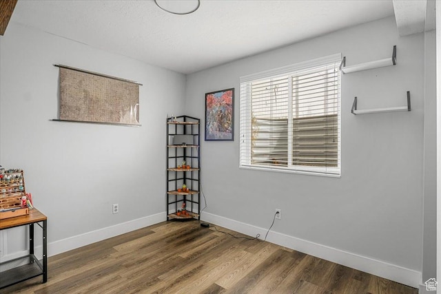 4799 S 3950 W, Roy, UT 84067 - unfurnished room with a textured ceiling, wood finished floors, and baseboards