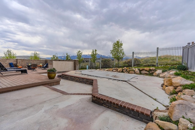 9061 N Clubhouse Ln, Eagle Mountain, UT 84005 - view of patio / terrace with fence and a deck
