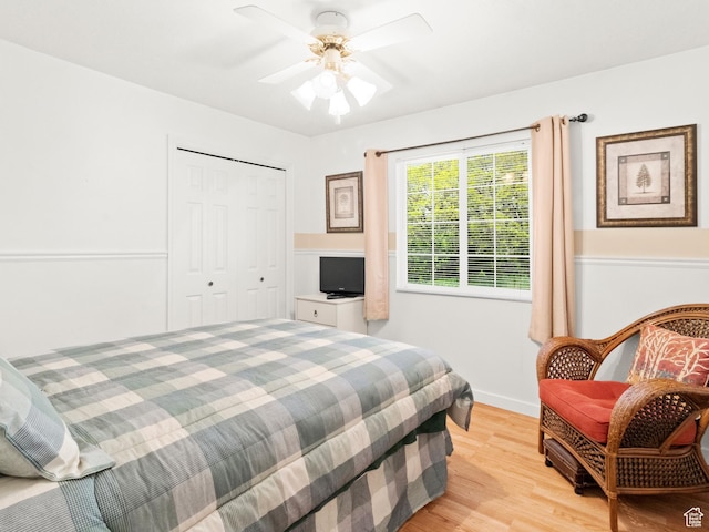 3677 N Willowbrook Ln, Eden, UT 84310 - bedroom with light wood finished floors, a closet, a ceiling fan, and baseboards