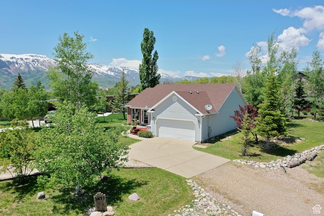 3677 N Willowbrook Ln, Eden, UT 84310 - ranch-style house with a mountain view, driveway, a front yard, and an attached garage