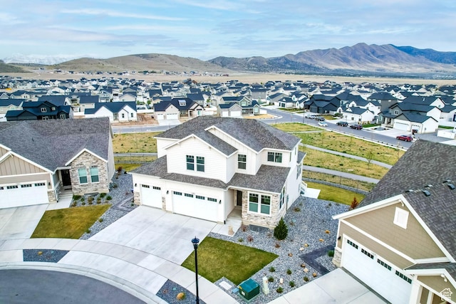 bird's eye view with a residential view and a mountain view