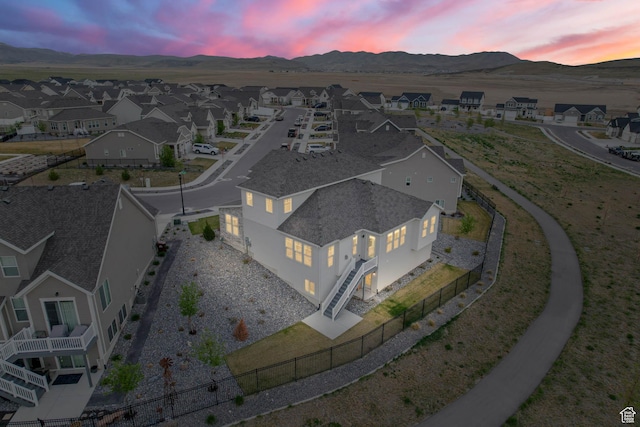 1368 E Clipper Peaks N, Eagle Mountain, UT 84005 - aerial view at dusk of a mountain view and a residential view