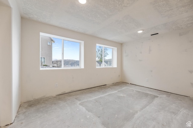 spare room with visible vents