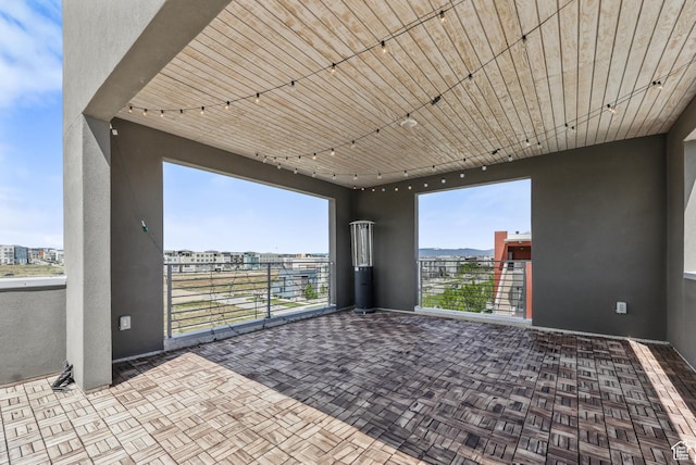 view of patio with a balcony
