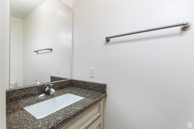 half bath with toilet and vanity