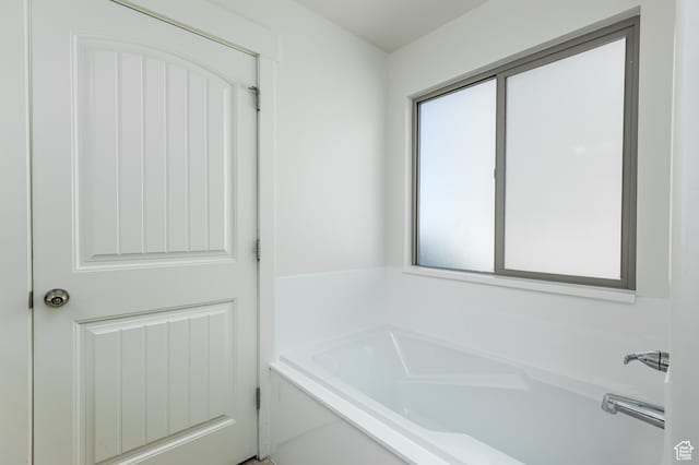 full bathroom with a garden tub
