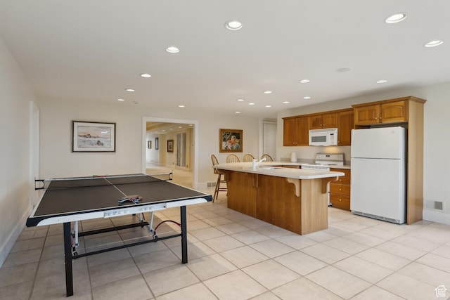 1714 Ridge Point Dr, Bountiful, UT 84010 - game room with recessed lighting, a sink, baseboards, and visible vents